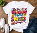 Spread positivity wherever you go with our “Be The Reason Someone Smiles Today” Graphic Tee 💫